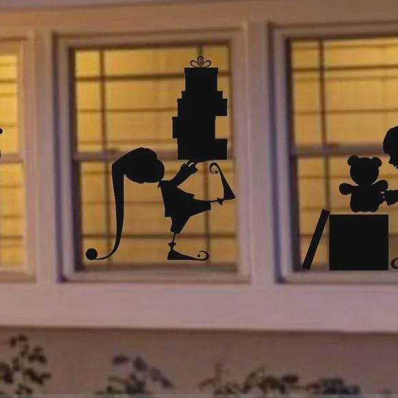 Giant CHRISTMAS ELF carrying Christmas Window Cling Decal silhouette|Reusable