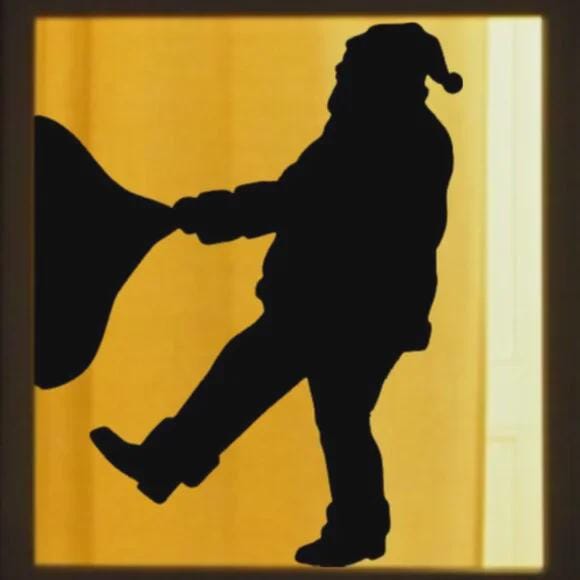 Santa Pulling Heavy Gift Sack Christmas Window Decal | Large Reusable Holiday Cling