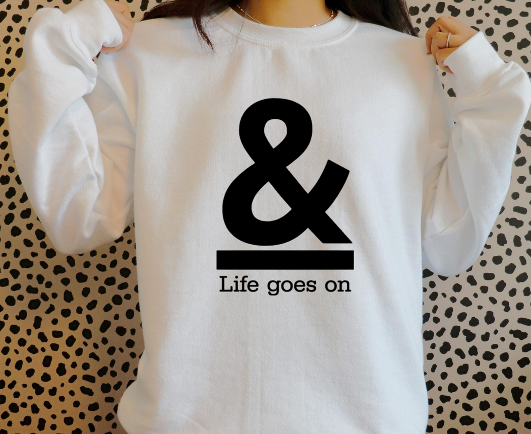 And Life Goes On Iron On Vinyl Decal | Custom HTV Text | Apparel Fabric Transfer | No Background