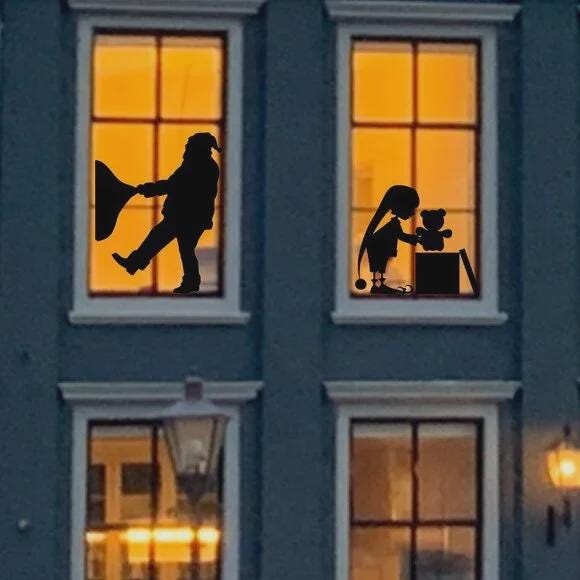 Santa Pulling Heavy Gift Sack Christmas Window Decal | Large Reusable Holiday Cling